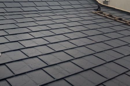 Dacheindeckung mit Metallschindeln